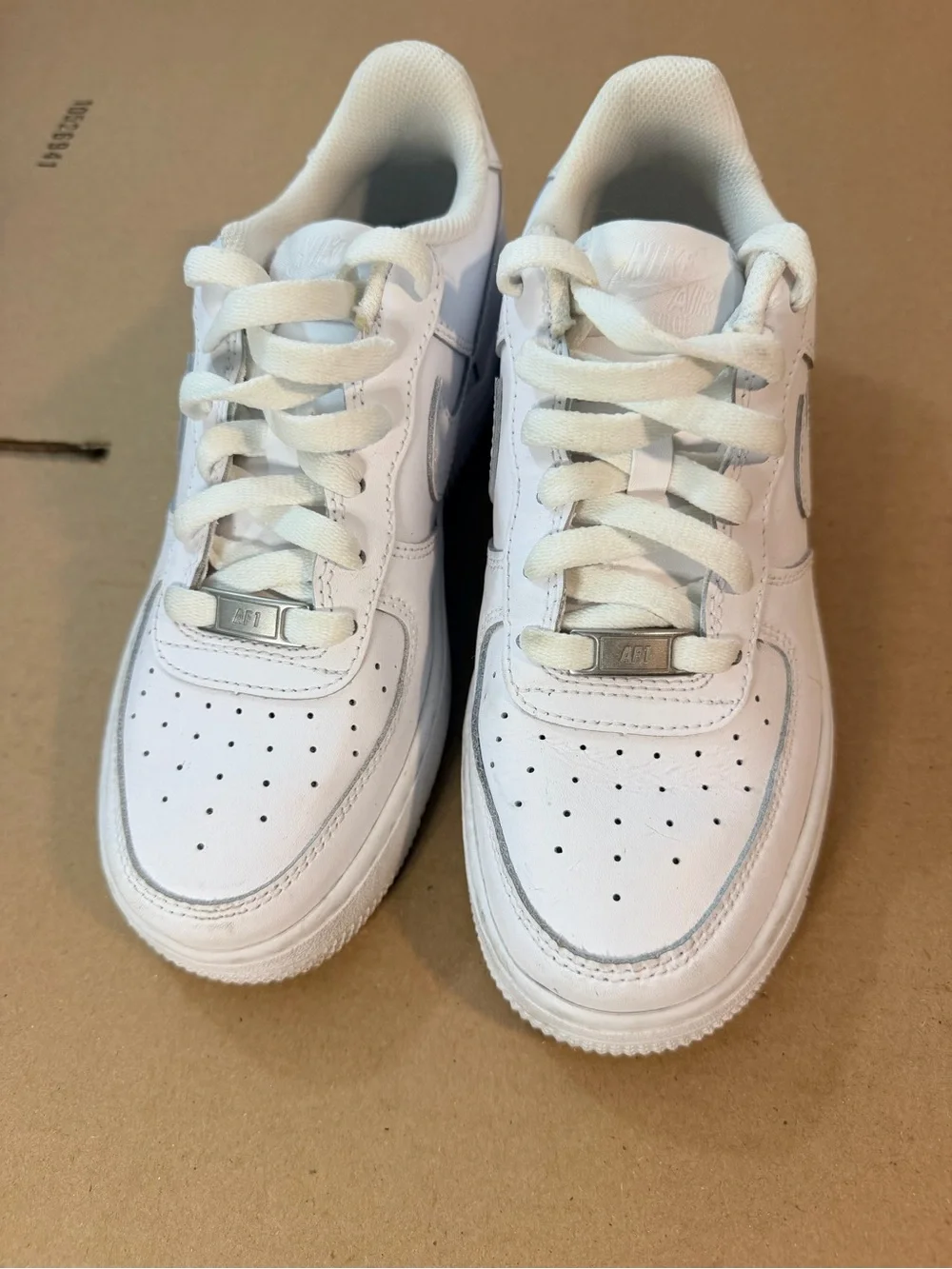 Nike Kids White Low-Top Leather Sneakers with Lace-Up Closure